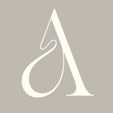 ALMA Kosmetik & Wellness Icon mit geschwungenem "A" auf neutralem Hintergrund.